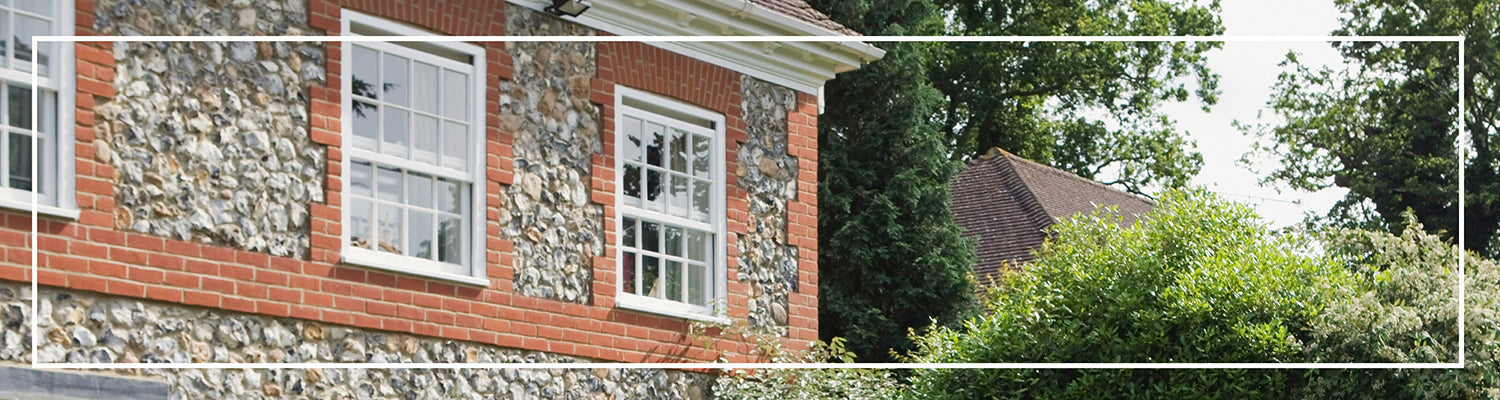 Fassade streichen auf Naturstein